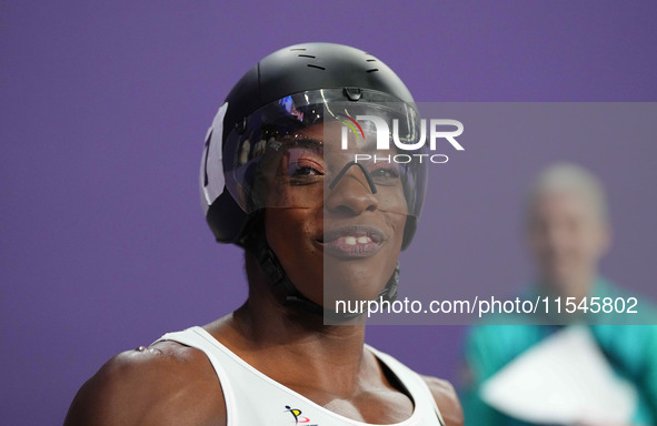 Lea Bayekula of Belgium celebrates winning gold in Women's 100m - T54 Final during the Paris 2024 Paralympic Games at Stade de France on Sep...