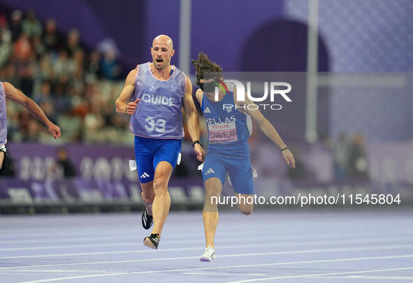 Athanasios Ghavelas of Greece in action in Men's 100m - T11 Semi-Finals during the Paris 2024 Paralympic Games at Stade de France on Septemb...