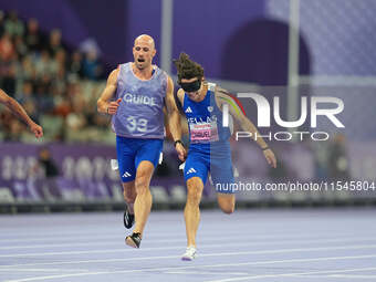 Athanasios Ghavelas of Greece in action in Men's 100m - T11 Semi-Finals during the Paris 2024 Paralympic Games at Stade de France on Septemb...