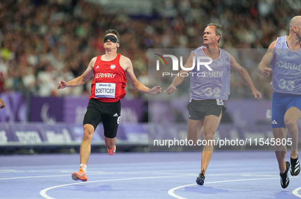 Marcel Boettger of Germany in action in Men's 100m - T11 Semi-Finals during the Paris 2024 Paralympic Games at Stade de France on September...