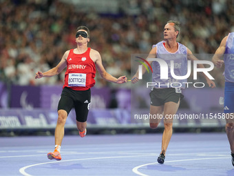 Marcel Boettger of Germany in action in Men's 100m - T11 Semi-Finals during the Paris 2024 Paralympic Games at Stade de France on September...