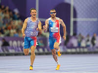 Timothee Adolphe of France in action in Men's 100m - T11 Semi-Finals during the Paris 2024 Paralympic Games at Stade de France on September...