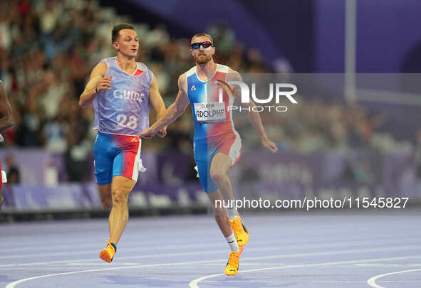 Timothee Adolphe of France in action in Men's 100m - T11 Semi-Finals during the Paris 2024 Paralympic Games at Stade de France on September...