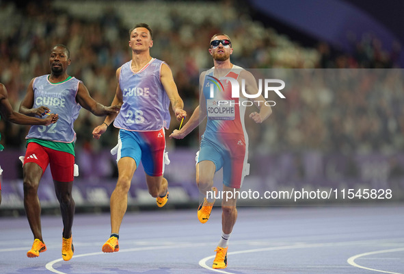 Timothee Adolphe of France in action in Men's 100m - T11 Semi-Finals during the Paris 2024 Paralympic Games at Stade de France on September...