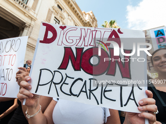 Temporary teachers, support teachers, and parents of disabled children demonstrate in front of the Ministry of Education and Merit against p...