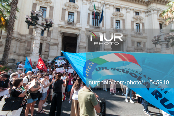 Temporary teachers, support teachers, and parents of disabled children demonstrate in front of the Ministry of Education and Merit against p...