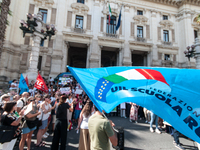 Temporary teachers, support teachers, and parents of disabled children demonstrate in front of the Ministry of Education and Merit against p...