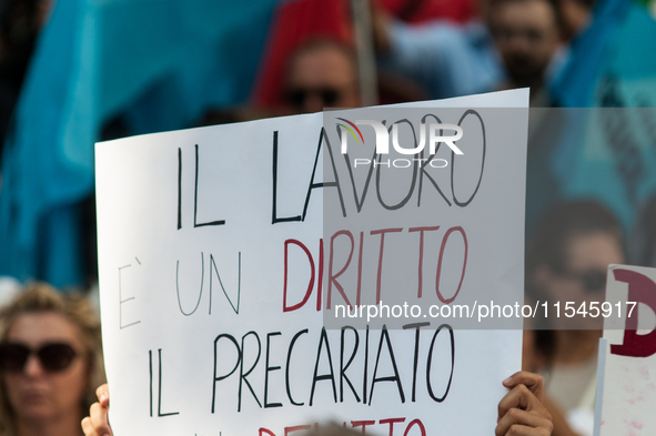 Temporary teachers, support teachers, and parents of disabled children demonstrate in front of the Ministry of Education and Merit against p...