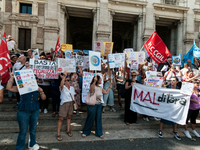 Temporary teachers, support teachers, and parents of disabled children demonstrate in front of the Ministry of Education and Merit against p...