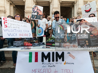 Temporary teachers, support teachers, and parents of disabled children demonstrate in front of the Ministry of Education and Merit against p...