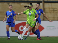 Tatjana Osmajic of Breznica is closely followed by Gabriella Zahra of Birkirkara during the UEFA Women's Champions League First qualifying r...