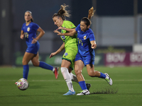 Marijana Jankov of Breznica is closely followed by Yuna Hazekawa of Birkirkara during the UEFA Women's Champions League First qualifying rou...