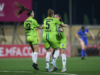 Marijana Jankov (center) of Breznica reacts after scoring the 1-0 goal with teammates during the UEFA Women's Champions League First qualify...