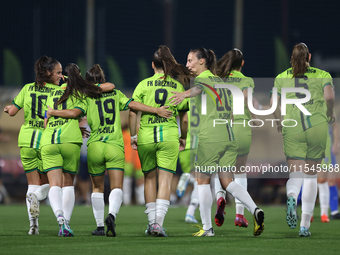 Soccer players from Breznica celebrate Marijana Jankov (center back partially hidden) scoring the 1-0 goal during the UEFA Women's Champions...