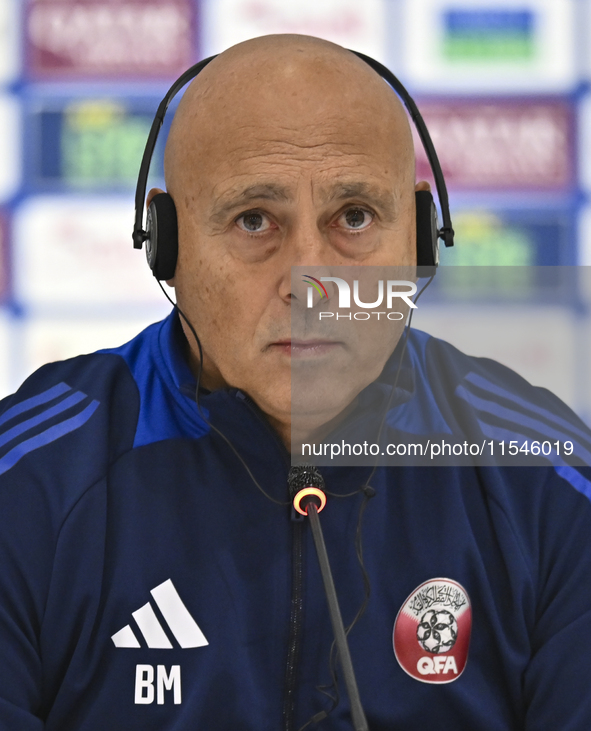 Qatar national team head coach Marquez Lopez attends a press conference at Ahmad Bin Ali Stadium in Al Rayyan, Qatar, on September 4, 2024,...