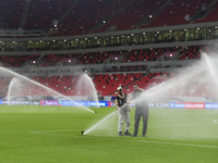 Sprinklers water the pitch inside Ahmad Bin Ali Stadium before the training session ahead of the FIFA World Cup 2026 AFC Asian qualifier 3rd...