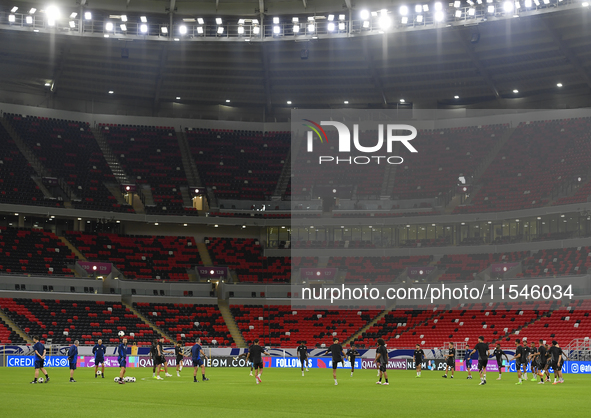 Players of the Qatar National team train at Ahmad Bin Ali Stadium in Al Rayyan, Qatar, on September 4, 2024, on the eve of their Qualificati...