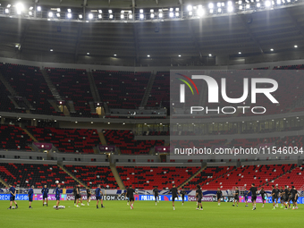 Players of the Qatar National team train at Ahmad Bin Ali Stadium in Al Rayyan, Qatar, on September 4, 2024, on the eve of their Qualificati...