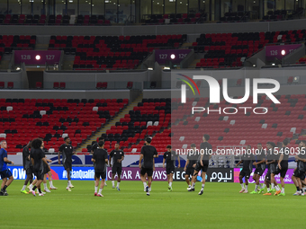 Players of the Qatar National team train at Ahmad Bin Ali Stadium in Al Rayyan, Qatar, on September 4, 2024, on the eve of their Qualificati...