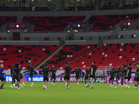 Players of the Qatar National team train at Ahmad Bin Ali Stadium in Al Rayyan, Qatar, on September 4, 2024, on the eve of their Qualificati...