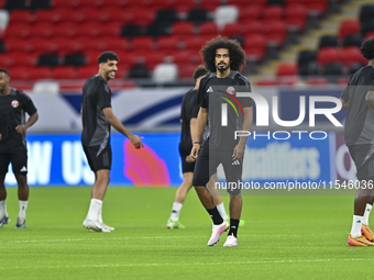 Akram Afif of Qatar trains at Ahmad Bin Ali Stadium in Al Rayyan, Qatar, on September 4, 2024, on the eve of their Qualification 3rd Round f...