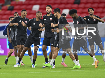 Players of the Qatar National team train at Ahmad Bin Ali Stadium in Al Rayyan, Qatar, on September 4, 2024, on the eve of their Qualificati...