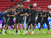 Players of the Qatar National team train at Ahmad Bin Ali Stadium in Al Rayyan, Qatar, on September 4, 2024, on the eve of their Qualificati...