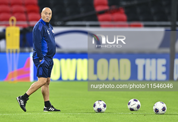 Head coach Marquez Lopez of the Qatar national team attends a training session at Ahmad Bin Ali Stadium in Al Rayyan, Qatar, on September 4,...