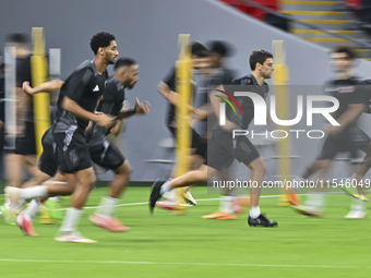 Players of the Qatar National team train at Ahmad Bin Ali Stadium in Al Rayyan, Qatar, on September 4, 2024, on the eve of their Qualificati...