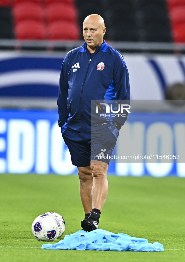 Head coach Marquez Lopez of the Qatar national team attends a training session at Ahmad Bin Ali Stadium in Al Rayyan, Qatar, on September 4,...