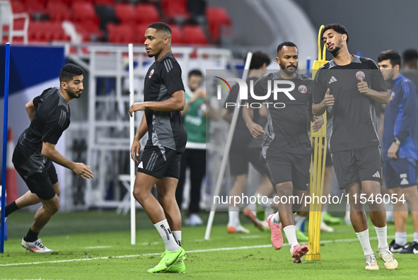 Players of the Qatar National team train at Ahmad Bin Ali Stadium in Al Rayyan, Qatar, on September 4, 2024, on the eve of their Qualificati...