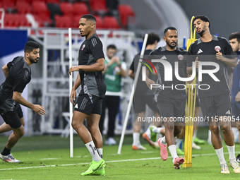 Players of the Qatar National team train at Ahmad Bin Ali Stadium in Al Rayyan, Qatar, on September 4, 2024, on the eve of their Qualificati...