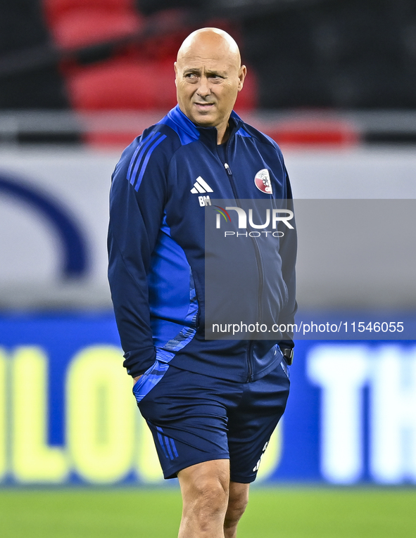 Head coach Marquez Lopez of the Qatar national team attends a training session at Ahmad Bin Ali Stadium in Al Rayyan, Qatar, on September 4,...