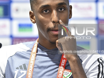 United Arab Emirates national team player Khalifa Al Hammadi attends a press conference at Ahmad Bin Ali Stadium in Al Rayyan, Qatar, on Sep...