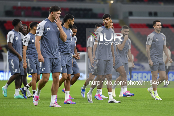 Players of the United Arab Emirates National team train at Ahmad Bin Ali Stadium in Al Rayyan, Qatar, on September 4, 2024, on the eve of th...