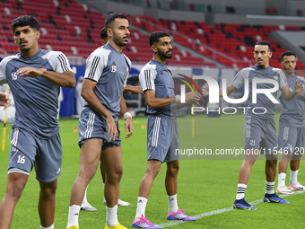 Players of the United Arab Emirates National team train at Ahmad Bin Ali Stadium in Al Rayyan, Qatar, on September 4, 2024, on the eve of th...