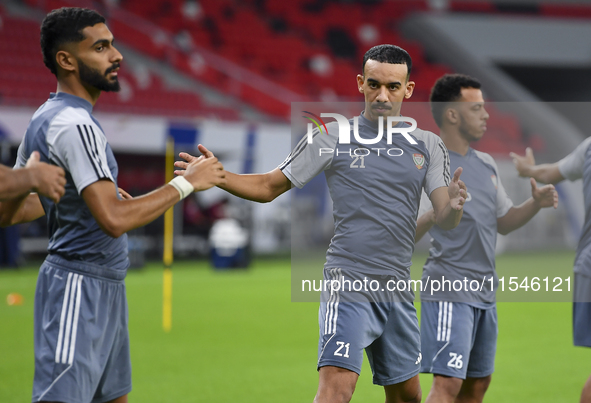 Issam Faiz (C) of the United Arab Emirates National Team trains at Ahmad Bin Ali Stadium in Al Rayyan, Qatar, on September 4, 2024, on the e...