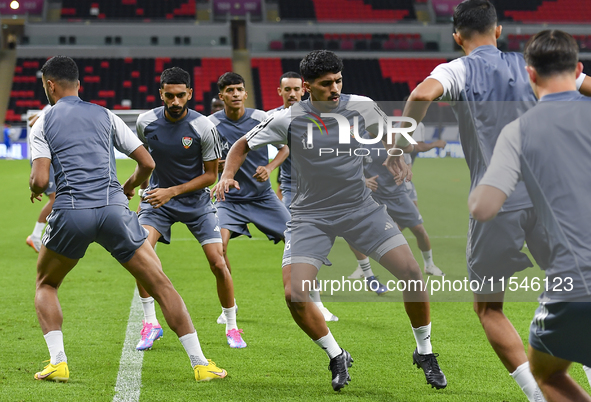 Players of the United Arab Emirates National team train at Ahmad Bin Ali Stadium in Al Rayyan, Qatar, on September 4, 2024, on the eve of th...