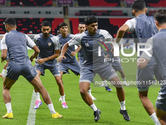 Players of the United Arab Emirates National team train at Ahmad Bin Ali Stadium in Al Rayyan, Qatar, on September 4, 2024, on the eve of th...