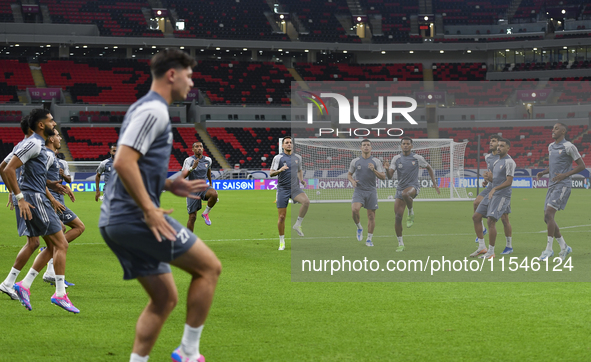 Players of the United Arab Emirates National team train at Ahmad Bin Ali Stadium in Al Rayyan, Qatar, on September 4, 2024, on the eve of th...