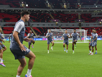 Players of the United Arab Emirates National team train at Ahmad Bin Ali Stadium in Al Rayyan, Qatar, on September 4, 2024, on the eve of th...