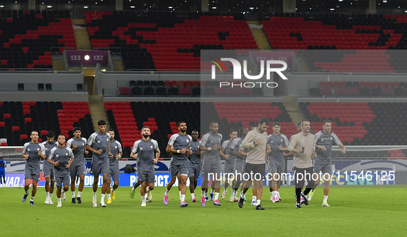 Players of the United Arab Emirates National team train at Ahmad Bin Ali Stadium in Al Rayyan, Qatar, on September 4, 2024, on the eve of th...