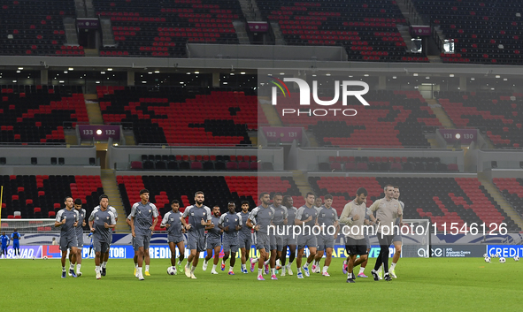 Players of the United Arab Emirates National team train at Ahmad Bin Ali Stadium in Al Rayyan, Qatar, on September 4, 2024, on the eve of th...