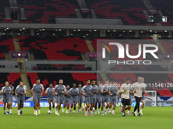 Players of the United Arab Emirates National team train at Ahmad Bin Ali Stadium in Al Rayyan, Qatar, on September 4, 2024, on the eve of th...