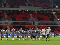 Players of the United Arab Emirates National team train at Ahmad Bin Ali Stadium in Al Rayyan, Qatar, on September 4, 2024, on the eve of th...