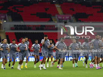 Players of the United Arab Emirates National team train at Ahmad Bin Ali Stadium in Al Rayyan, Qatar, on September 4, 2024, on the eve of th...