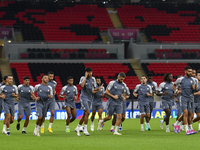 Players of the United Arab Emirates National team train at Ahmad Bin Ali Stadium in Al Rayyan, Qatar, on September 4, 2024, on the eve of th...