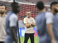 Head coach Paulo Bento of the United Arab Emirates National Team attends a training session at Ahmad Bin Ali Stadium in Al Rayyan, Qatar, on...