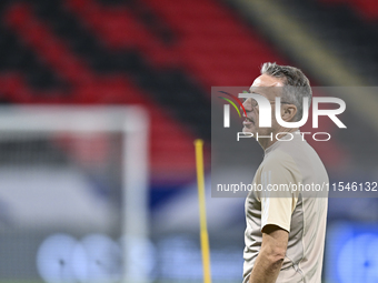 Head coach Paulo Bento of the United Arab Emirates National Team attends a training session at Ahmad Bin Ali Stadium in Al Rayyan, Qatar, on...