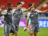 Caio Canedo (C) and Fabio De Lima (R) of the United Arab Emirates National Team train at Ahmad Bin Ali Stadium in Al Rayyan, Qatar, on Septe...